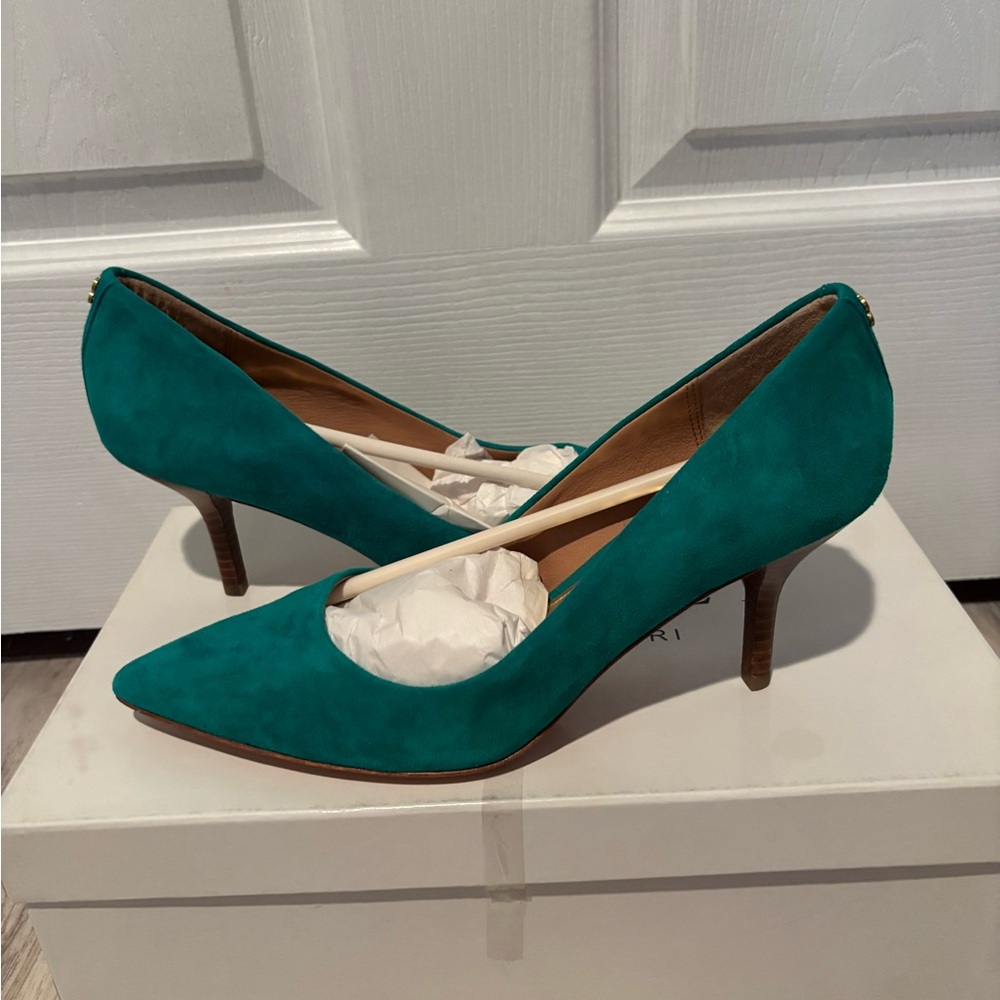Coach Teal Heels